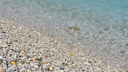 The white rounded stone of the shore La Sorgente in Elba island