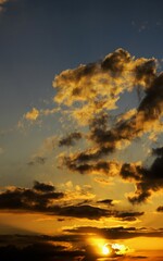 Beautiful sunset with dramatic, dark clouds