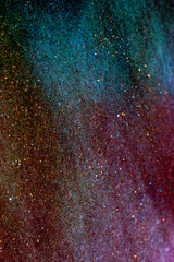 Close Up of Glitter and Shiny Coloured Powder for Background