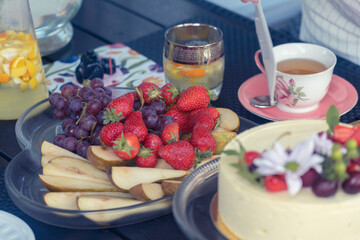 Festive table, served. Cake and tea utensils Congratulation concept. Birthday