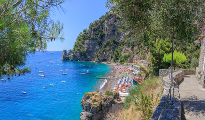 The beach of Fornillo is one of the main beaches of Positano on the Amalfi Coast, in Campania. The beach is small, composed of sand mixed with pebbles and light 