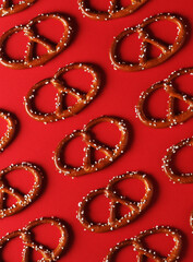 Red background with traditional German bretzel