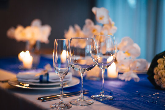 Wedding table decorations with orchids, candle light