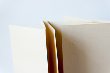 folded beige paper close up