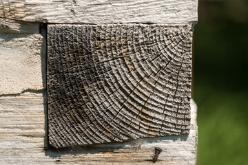 close up of a dovetail joint - wooden cabin