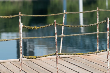 old rope fence on the pier