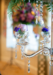 Decorative glass candle stick holder lamp with crystals filled with pink roses