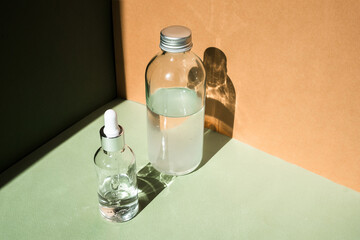 Dropper glass Bottle Mock-Up. Body treatment and spa. Natural beauty products. Eco cream, serum,...