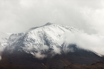 Snowy mountain peak with clouds in Salta, Argentina