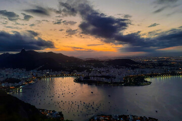 Touristic view of the city of Rio de Janeiro at sunset, from the top of the Sugar Loaf Mountain. Brazil