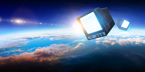 Retro TV flying in space . Mixed media