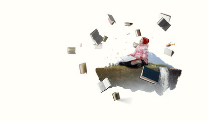 Little girl reading a book