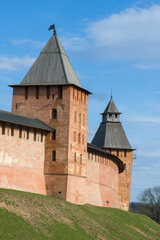 Fototapeta na wymiar Two towers of the ancient Novgorod Kremlin on a sunny April day. Veliky Novgorod, Russia