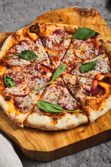 Pepperoni Pizza on Wooden Trat with Textile Napkin