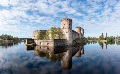 Aerial panorama view of Olavinlinna Castle in summer in Finland.