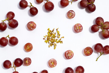 Fresh grape with seeds on white background.