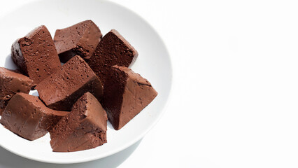 Chicken blood tofu in white bowl on white background