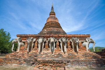 Sculptures of elephants on the base of the stupa of the ancient Buddhist temple Wat Sorasak....