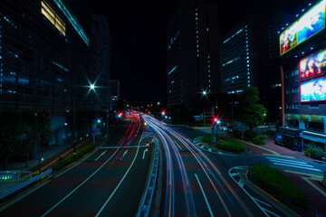 Fototapeta na wymiar A night traffic jam at the city street in Aoyama wide shot