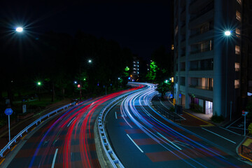A night traffic jam at the city street in Aoyama wide shot