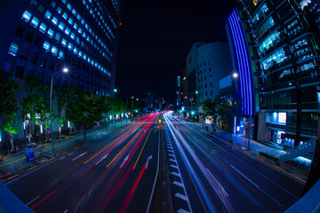 Fototapeta na wymiar A night traffic jam at the city street in Aoyama fish eye shot