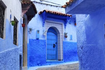 Entrance to the one of the old houses in Medina of Chefchaouen (Chaouen), Morocco. The city is noted for its buildings in shades of blue and that makes Chefchaouen very attractive to visitors.
