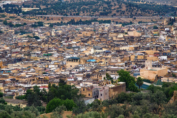 Fototapeta premium Aerial view of the Fez el Bali medina. Is the oldest walled part of Fez, Morocco. Fes el Bali was founded as the capital of the Idrisid dynasty between 789 and 808 AD.