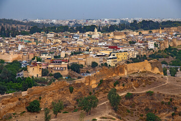Fototapeta na wymiar Aerial view of the Fez el Bali medina. Is the oldest walled part of Fez, Morocco. Fes el Bali was founded as the capital of the Idrisid dynasty between 789 and 808 AD