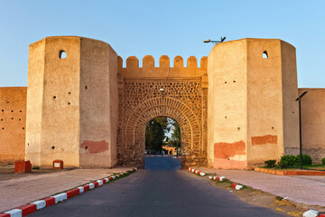 View of the yellow historical gate in the medina of Marrakesh on a sunny day. Morocco.