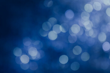 Fototapeta na wymiar abstract blue bokeh glitter sparkle background.