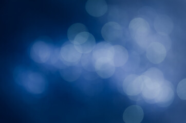 abstract blue bokeh glitter sparkle background.