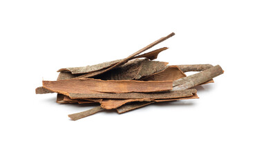 Spicy cinnamon bark close up on isolated white background