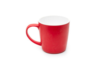 Old scratched red plastic coffee cup close up on isolated white background