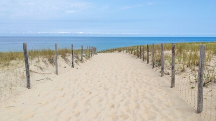 Beach Pathway on sand fence access sea in Cap-Ferret ocean atlantic in France