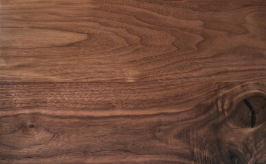 Texture of black walnut surface with oil finish