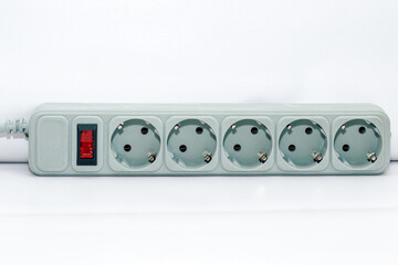 Carry extension cord with sockets. Wire for convenience in everyday life.