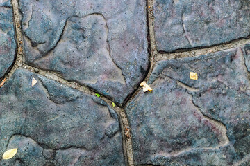 Texture of large old stone on the road, paving stones.