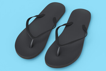 Beach black flip-flops or sandals isolated on blue background.