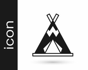 Black Traditional indian teepee or wigwam icon isolated on white background. Indian tent. Vector © Kostiantyn