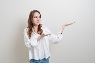 portrait beautiful woman with hand presenting or pointing