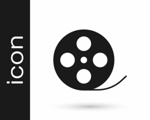 Black Film reel icon isolated on white background. Vector