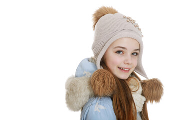 Close up portrait of happy little girl in warm clothes