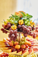 Fresh, Exotic, Organic Fruits, Light Snacks In A Plate On A Buffet Table. Assorted Mini Delicacies
