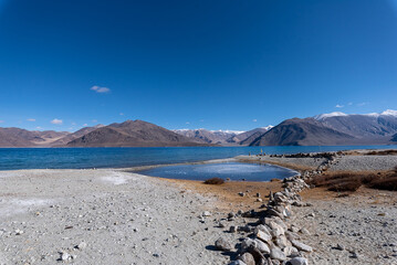 Pangong Tso, Tibetan for "high grassland lake", also referred to as Pangong Lake, is an endorheic lake in the Himalayas situated at a height of about 4,350 m. at Leh Ladakh, Jammu and Kashmir, India.	