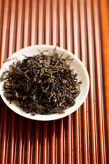 Puer tea dried on a bamboo board