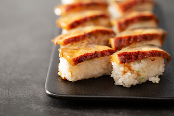 Seasoned eel sushi on a plate