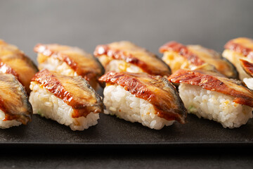 Seasoned eel sushi on a plate