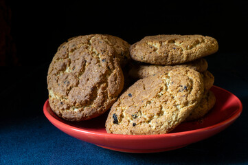 The Heap oat liver rests upon table on black background. The Sweet products of the feeding.