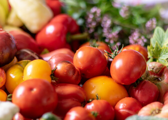 color photo with autumn vegetables on the table, different colors, shapes and types of vegetables prepared for home canning, autumn harvest time