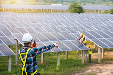 engineer working or checking equipment in solar power plant